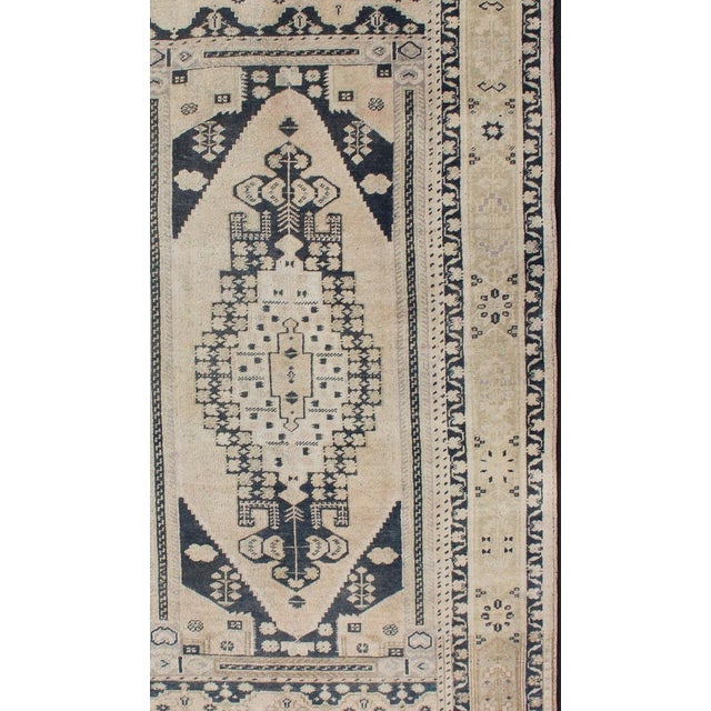 Tribal Vintage Turkish Oushak Rug With Ivory Field and Deep Blue Medallion Design For Sale - Image 3 of 11