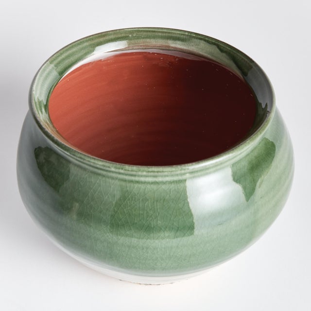 Inspired by traditional ceramics of southern Europe, this decorative drum vase really brings the charm. Handthrown with a...