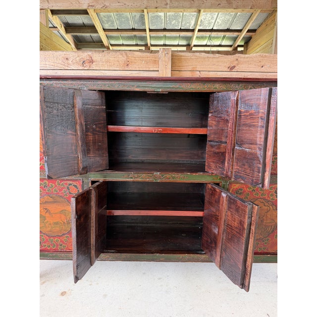 Vintage Tibetan Polychrome Painted Cabinet With Animal and Floral Panels For Sale - Image 11 of 12