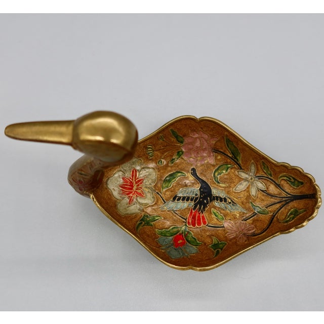 A beautifully detailed brass and champleve enamel duck dish with exceptional decorative work throughout. The body forms a...