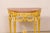 A French Neoclassical petite console table, with marble top and carved urn finial accent at underside, from the 19th...