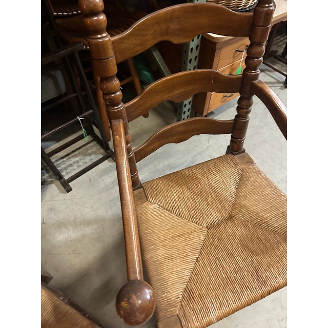 Up for consideration is a beautiful vintage pair of sturdy large ladder back chairs with one captains chair. These would...
