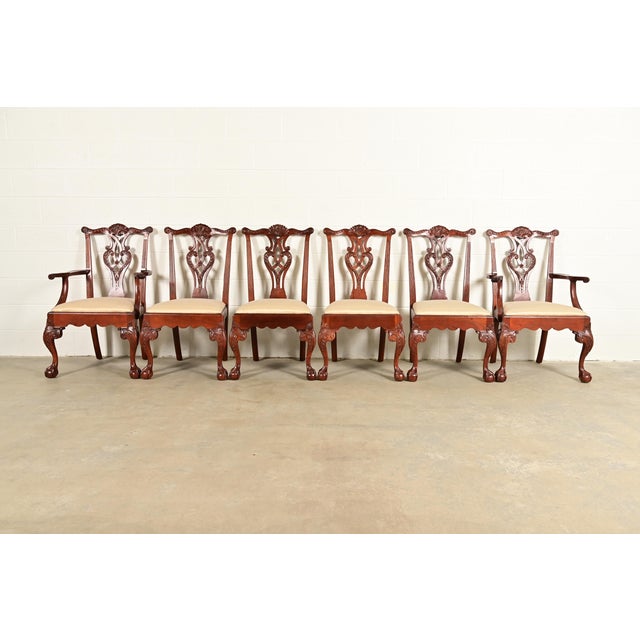 An outstanding set of six Chippendale or Georgian style dining chairs By Baker Furniture USA, Circa 1980s Carved solid...