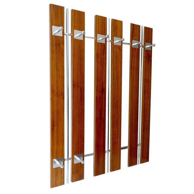 Large danish style mid-century coat rack, it is made of an aluminium structure with large rectangular wooden beam with...