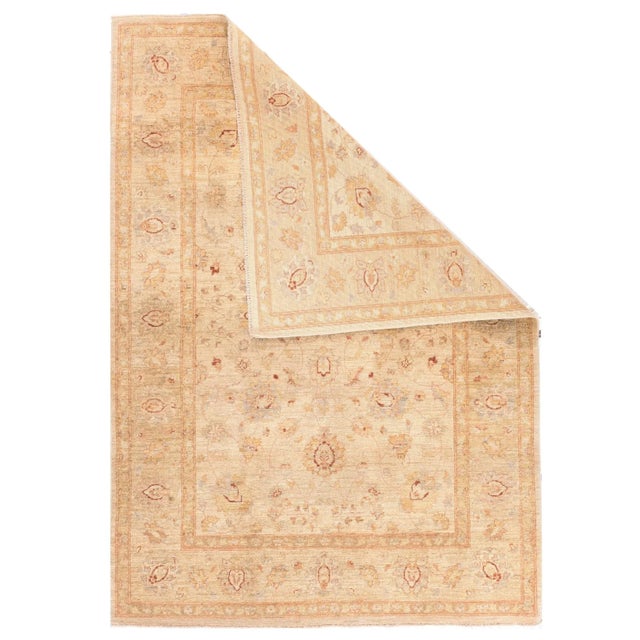 Post WWII scatters and larger pieces in Persian curvilinear styles woven in the Pakistani city of Peshawar. Medium weave,...