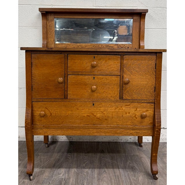 This is a stunning beautiful antique Arts & Crafts buffet crafted from quarter-sawn white oak, featuring an original...