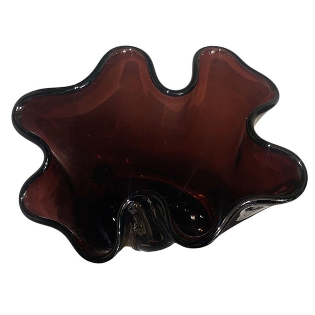 A striking hand-blown Murano glass vase signed by Camozzo, Italy, late 20th century. The tall sculptural body is rendered...