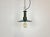 Industrial blue enamel pendant light made in Poland during the 1960s. White enamel inside the shade. Green cast aluminium...