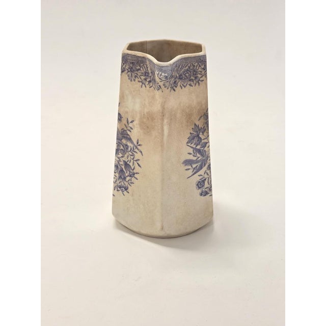 Old Arabia jug with stamp from the 1917-1927. The jug has wear consistent with its age. Beautiful traditional blue flower...