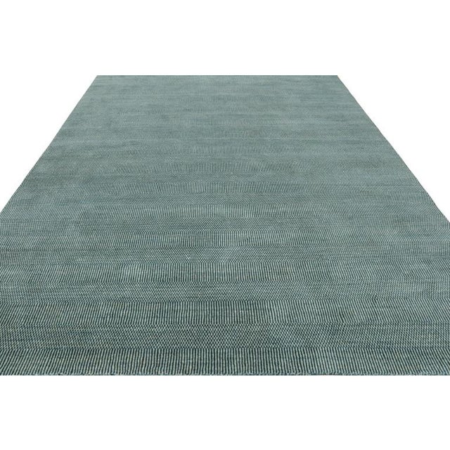 This wool 9x12 rug is a new addition to Rug & Kilim’s Modern Collection, and represents a new series of custom-capable...