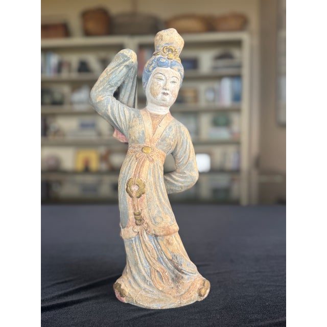 Carved wooden figure of a dancing court lady, China, early 20th century, likely dating to the 1920s. The figure is modeled...