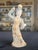 Carved wooden figure of a dancing court lady, China, early 20th century, likely dating to the 1920s. The figure is modeled...