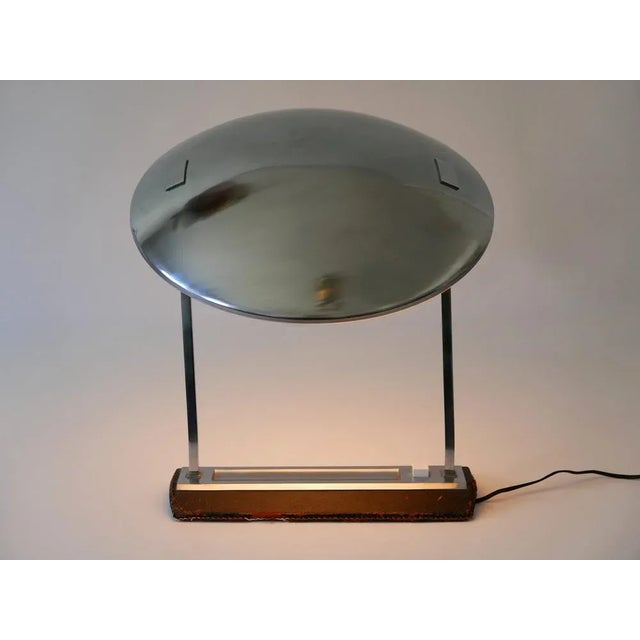 Extremely rare and elegant Mid-Century Modern desk light or table lamp. Model 8050. Adjustable diffusor. Designed by...