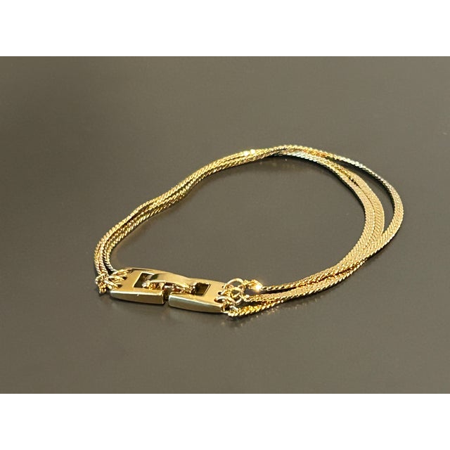 Monet Vintage Monet Gold-Tone Multi-Strand Flat Weave Chain Bracelet – Iconic 1970s/1980s Statement Jewelry For Sale - Image 4 of 13