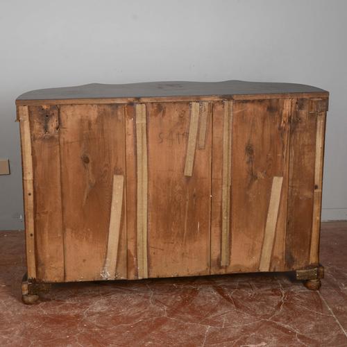 This elegant vintage sideboard represents a refined example of classic cabinetmaking, characterized by flowing lines and a...