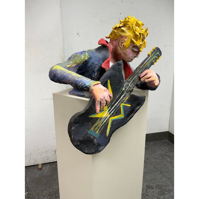 Design Plus Gallery presents a Circa 1989 Bondene Allen Ceramic Figural Rock Star Sculpture + Pedestal Stand. This...