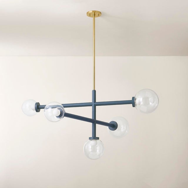 Inspired by a mobile, Sia nods to designs of the 1950s and 60s with its symmetry and bold style. Available as a chandelier...
