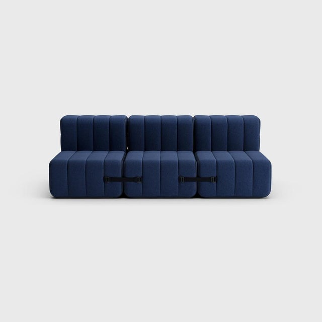 A sofa bed, how boring! Boring, my ass. How many configurations you can create with six Curt modules, we didn't even...