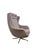 A dramatic modern lounge chair inspired by mid-century and Scandinavian Modern seating, featuring a tall sculptural...