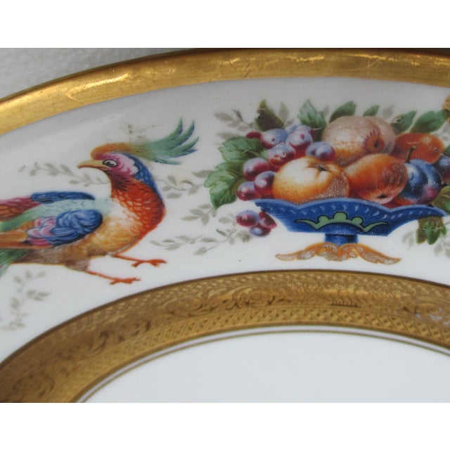 Impressive pattern by Black Knight Porcelain (formerly Hutschenreuther), 11" in diameter, the larger chop plates with a...