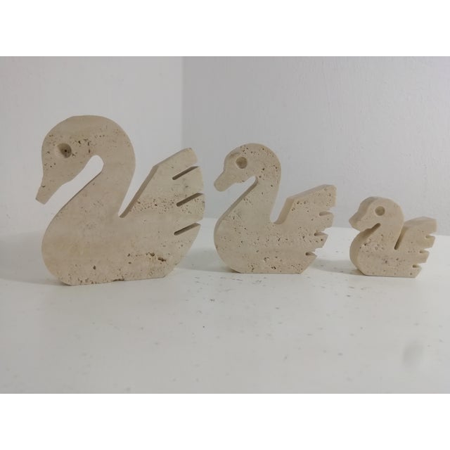 Trio of swans in travertine by Enzo Mari for Fratelli Mannelli. Excellent condition, intact in all parts. I have official...