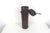This is an old hard leather tube or canister with a lid with strap closure. This is very old, has great patina, scratches,...