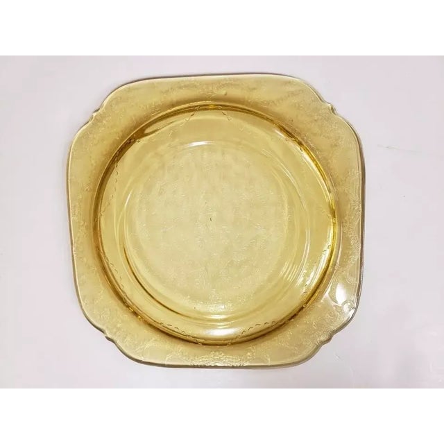 This is a Vintage Federal Glass Madrid Salad Plate, Amber/Yellow. It measures 3/4" high and 7 1/2“ in diameter. The piece...