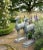 Pair of Patinated Bronze Garden Deer Statues For Sale - Image 4 of 4