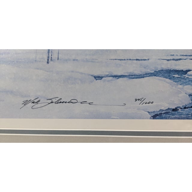 A beautifully presented signed and numbered limited edition panoramic print depicting a tranquil winter landscape with a...