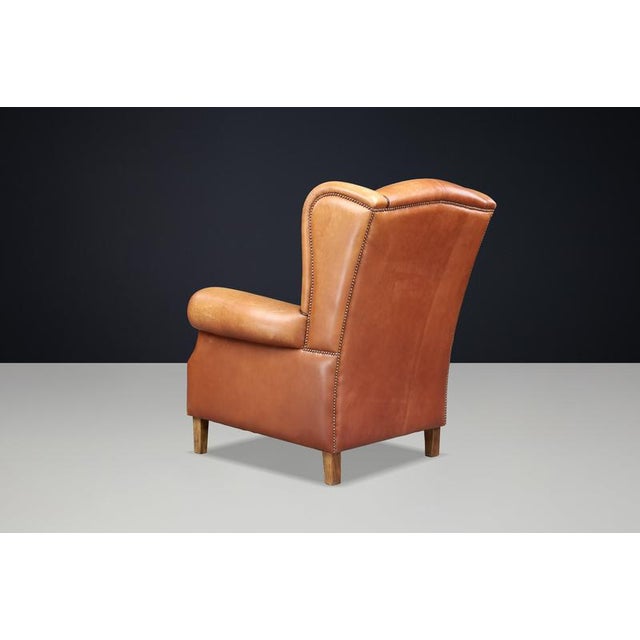 1960s Patinated Cognac Leather Wingback Lounge Chair, Netherlands, 1960s For Sale - Image 5 of 13