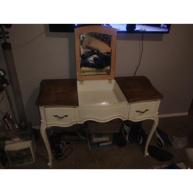 A cream white French provincial vanity with mirror elegant simple but beautiful vanity