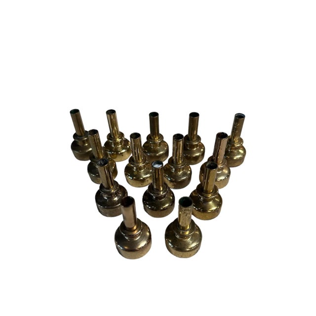 The Hans-Agne Jakobsson brass candle holder from the 1960s exemplifies sleek Scandinavian design, featuring a harmonious...