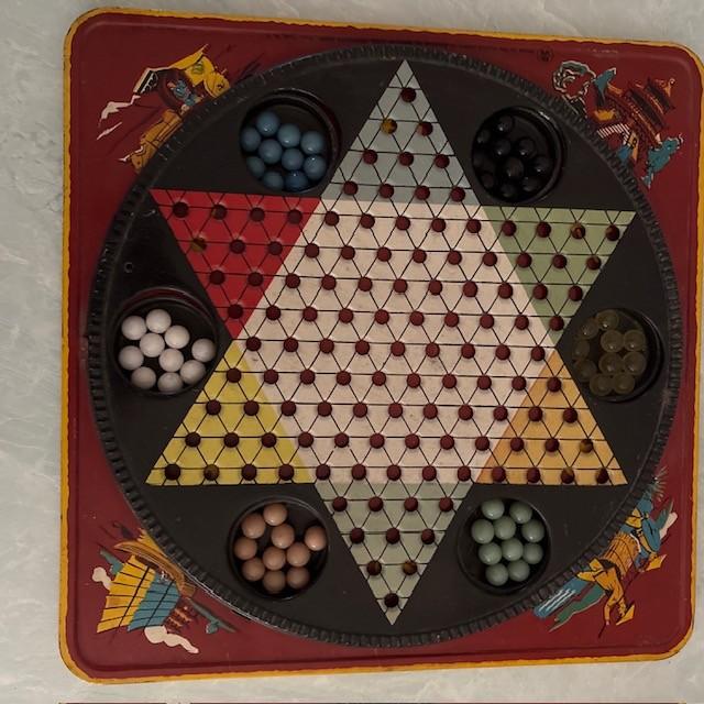 Fun vintage mid-century Chinese Checkers game, Made by Ranger of New York. Metal gameboard with colored marbles. Has neat...