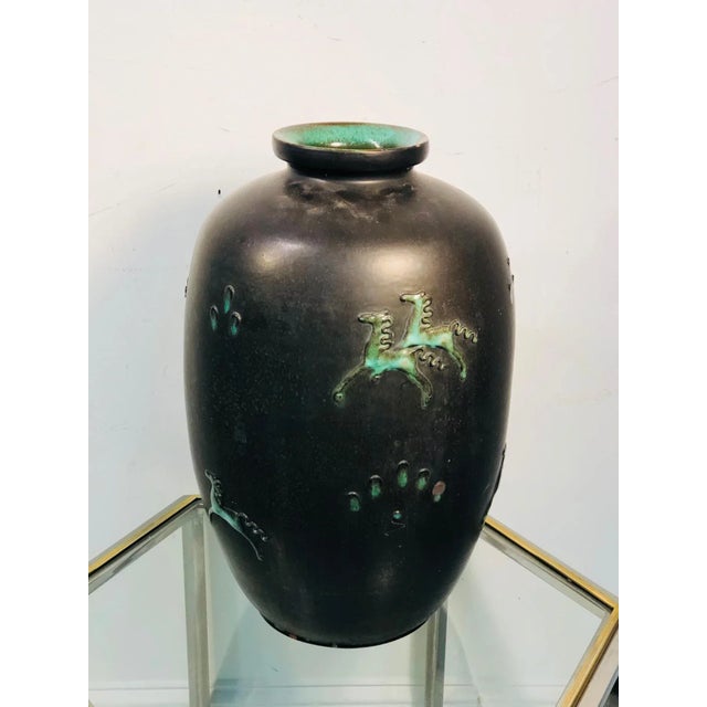 Origin Italy Period 1950-1979 Materials Ceramic Dimensions H. 21 in; Diam. 13 in; H. 53.34 cm; Diam. 33.02 cm; Condition...