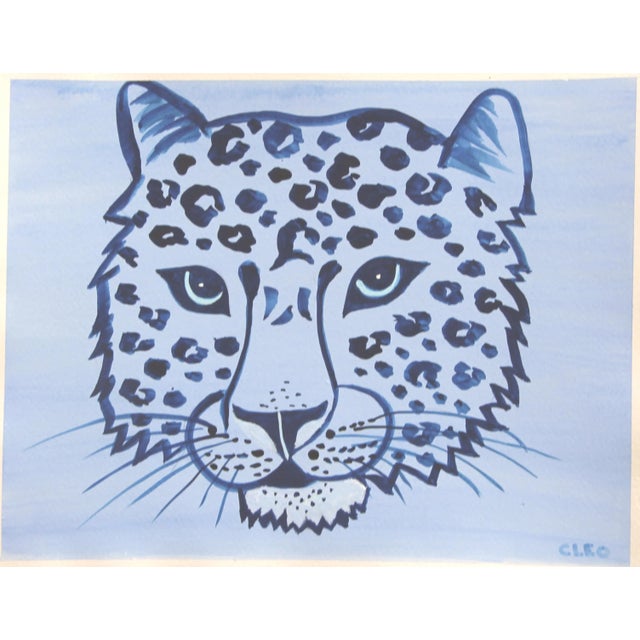 A leopard portrait with blue eyes in shades of navy blue and light blue, inspired by blue and white Chinese paintings. Pop...