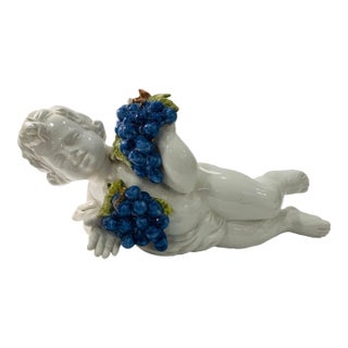 Italian Ceramic Putti With Grapes For Sale