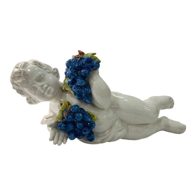 Italian Ceramic Putti With Grapes For Sale