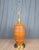 Impressive table lamp with hand painted ceramic base with brass trim. Unmarked, likely American and made in the 1960's or...