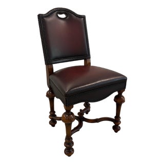 Early 20th Century Theodore Alexander Burgundy Leather and Brass Studded Armless Side Chair for Library Dining For Sale
