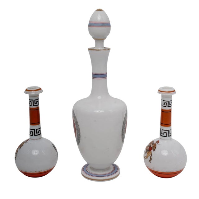 A charming set of three 19th-century French opaline glass pieces featuring classical Greco-Roman portrait decoration. The...