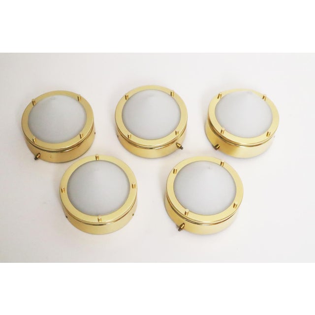 One of the lights has a small dent that is not noticeable when installed. The light can easily be converted to LED. This...