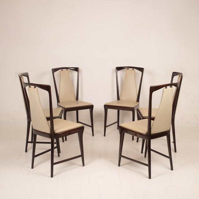 Overview elegant set of six dining chairs designed by osvaldo borsani for arredamenti borsani varedo, produced in italy...