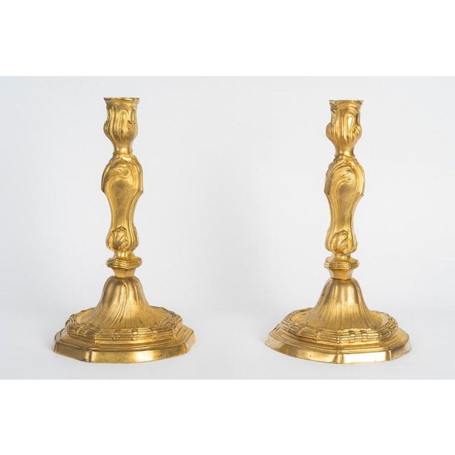 Pair of gilded bronze candlesticks in the louis xvi style, 19th century, napoleon iii period. Pair of gilded bronze...