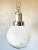 Beautiful mid - Century design. 1970s Italian pendant lamp made by Mazegga. Chrome base with glass globe finished with...