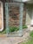 Mid 20th Century Modern Étagère Bookcase in the Style of Walter Lamb Iron and Glass.