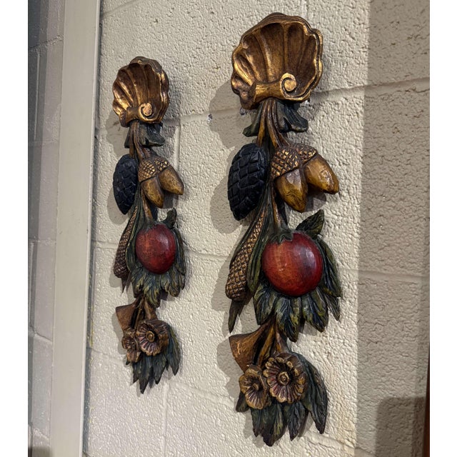 Decorate a dining room or living room wall with this elegant pair of antique polychromed wall sculptures. Hand carved in...