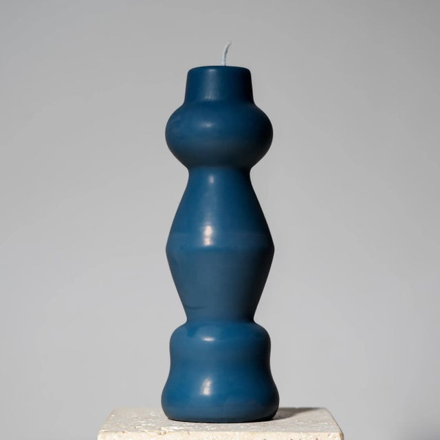 Hand-poured sculptural pillar candle inspired by postmodern design, made with 100% USA beeswax and a cotton wick. This...