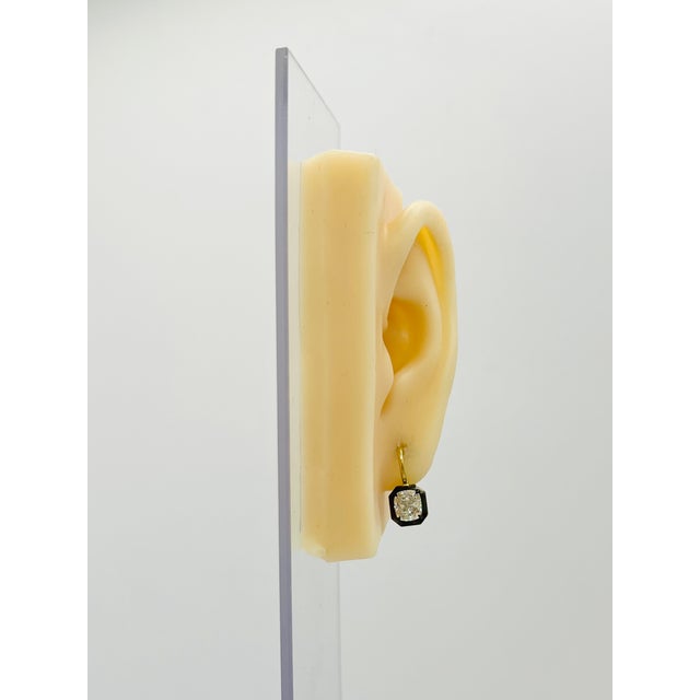 Gorgeous 3.02 ct. I VS2 white diamond cushions, each stone is 1.50 ct. Handmade in 18k yellow gold and black rhodium. GIA...