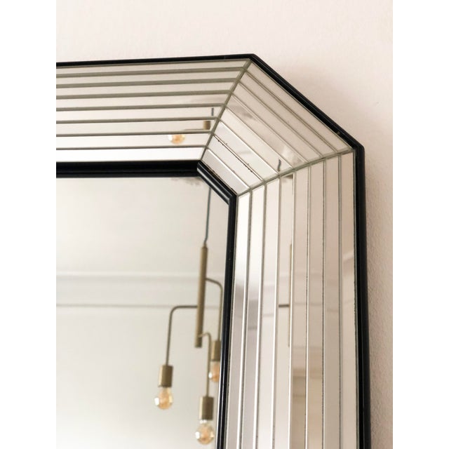 Large full length mirror by Deknudt, made in Belgium in the 1980s. The mirror has beveled glass panels in a layered frame...