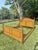 British Colonial Style Faux Bamboo & Woven Rattan Queen Bed in Tortoise Finish Exceptionally distinctive, this coveted...